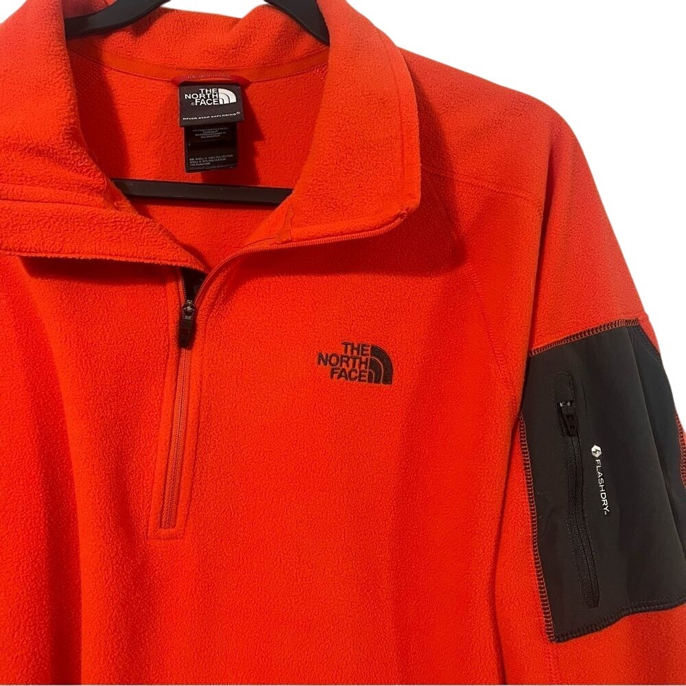 North Face XL men's orange long sleeved fleece pullover.